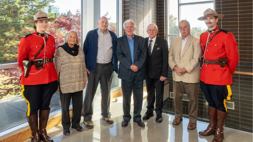 North Cowichan Freepersons with RCMP Red Serge (From left to right: Anne Murray, Jon Lefebure, Graham P. Bruce, Jim Dias and G. Glen Ridgway, K.C.)