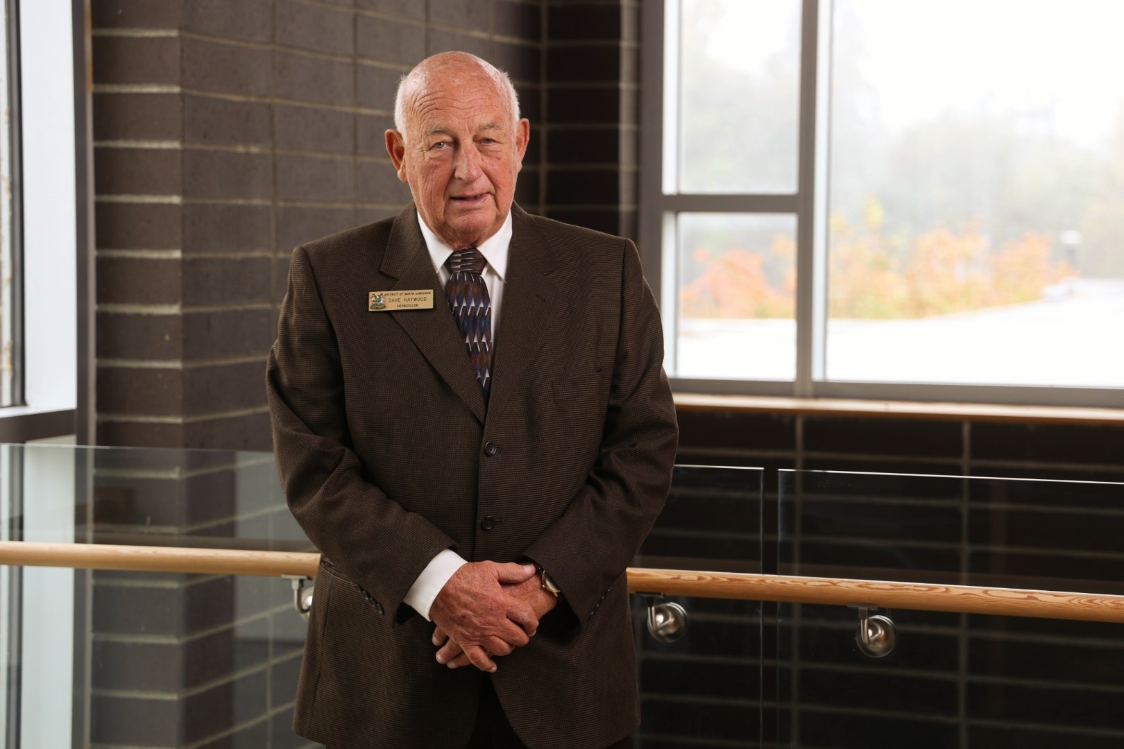David Haywood standing in front of some railings.